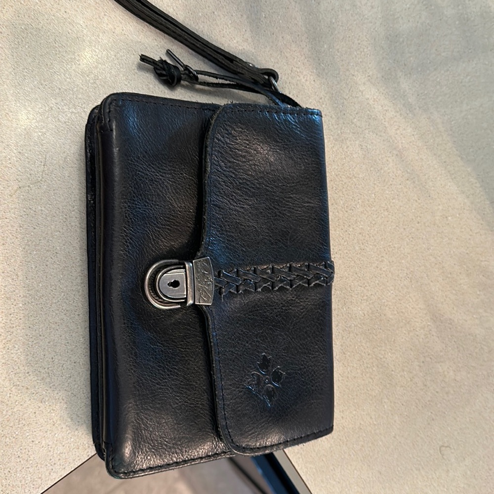 Patricia Nash crossbody.  Great , new condition.  Just too small .